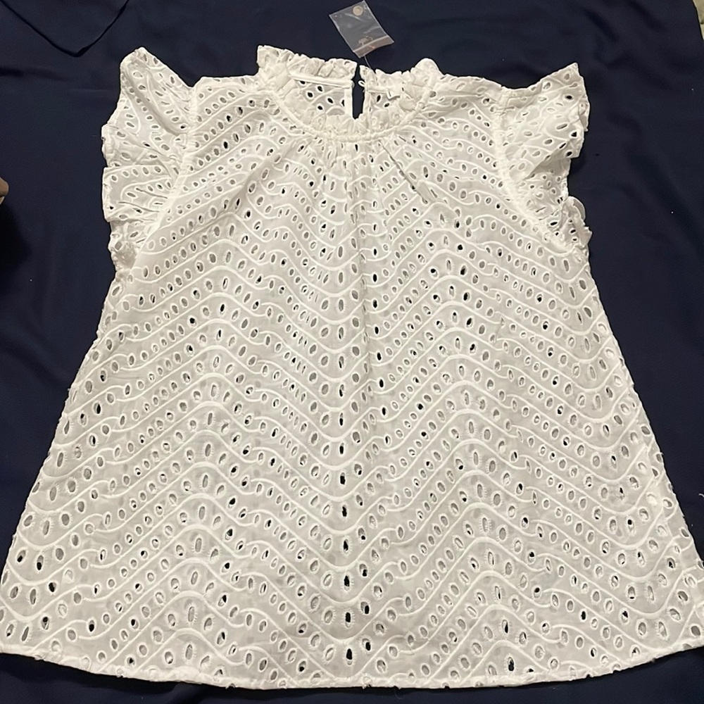 Never worn medium top.